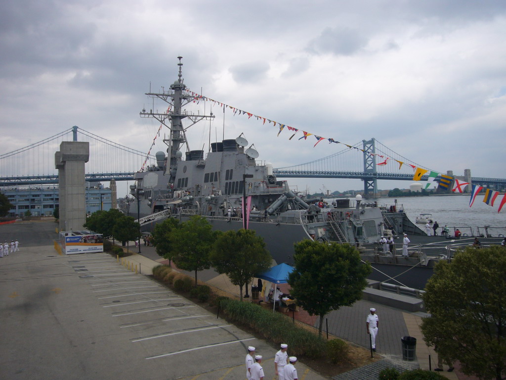 The Benjamin Franklin Bridge and a navy boat, from Penn`s Landing