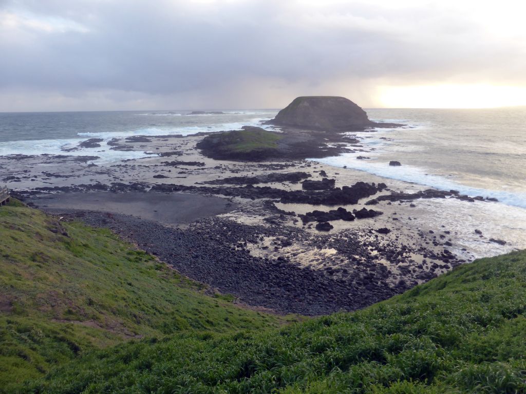 Round Island, the Seal Rocks and cliffs at the Bass Strait, viewed from the Nobbies Boardwalk