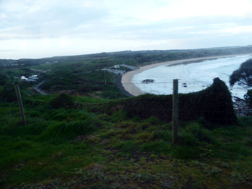 The Penguin Parade Visitor Centre and the grandstand at the Penguin Parade Beach, viewed from our tour bus at St. Helens Road