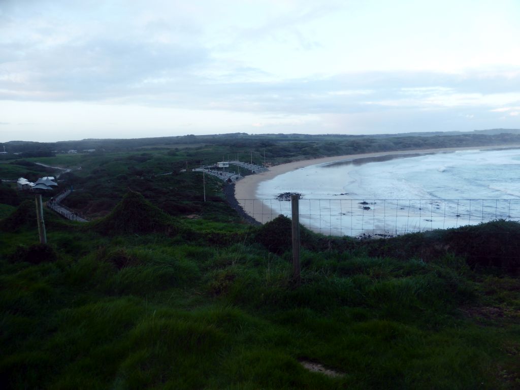 The Penguin Parade Visitor Centre and the grandstand at the Penguin Parade Beach, viewed from our tour bus at St. Helens Road