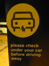 Sign at the parking place of the Penguin Parade Visitor Centre, by night