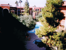 Inner garden with swimming pool of the Embassy Suites Hotel