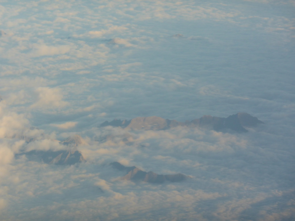 View on the Alps mountains, from the plane from Eindhoven