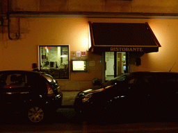 Front of the La Buca restaurant at the Via Massimo D`Azeglio street, by night