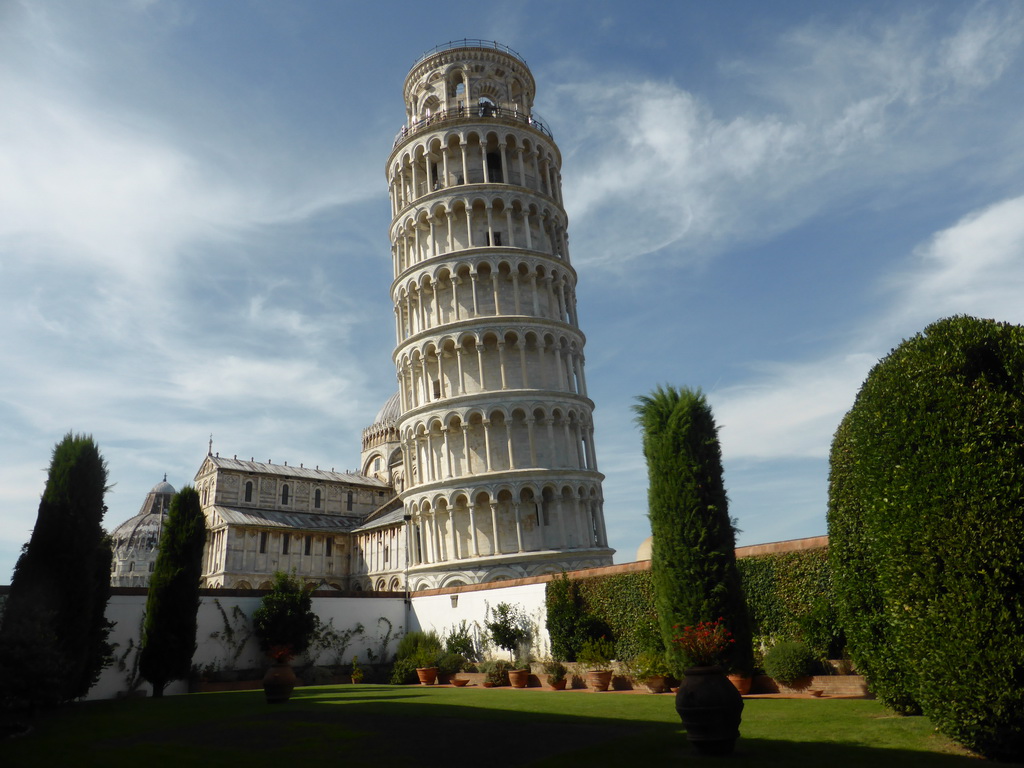 The Garden of the Museo dell`Opera del Duomo museum with a view on the Baptistry of St. John, the Pisa Duomo cathedral and the Leaning Tower of Pisa