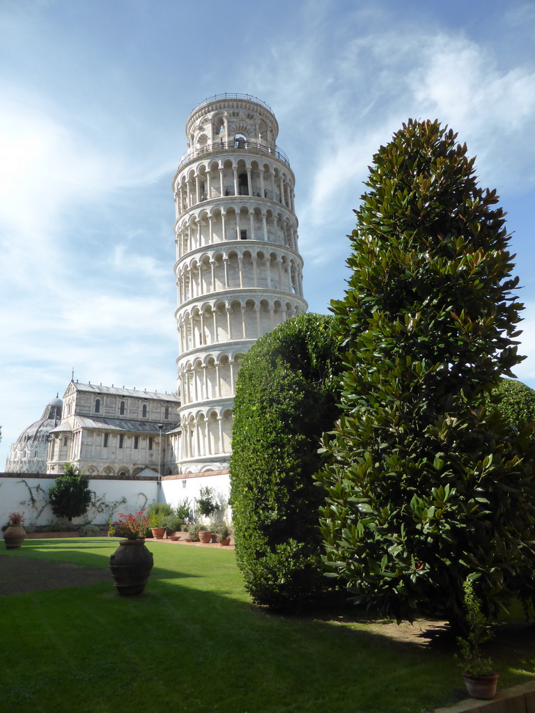 The Garden of the Museo dell`Opera del Duomo museum with a view on the Baptistry of St. John, the Pisa Duomo cathedral and the Leaning Tower of Pisa