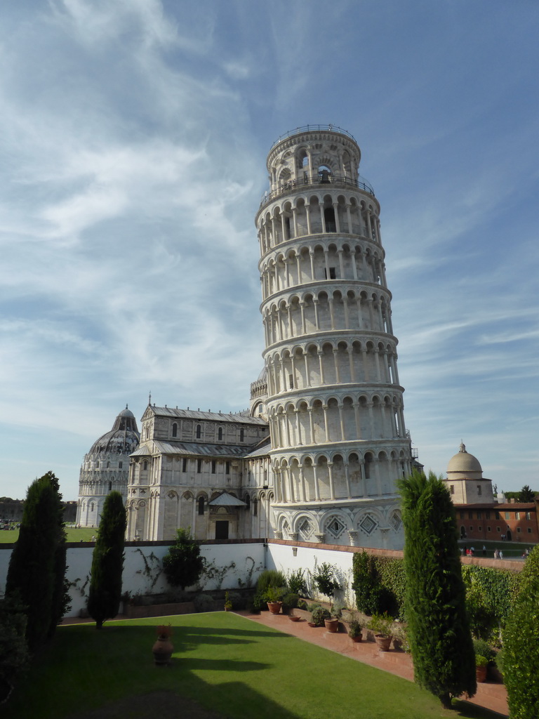 The Garden of the Museo dell`Opera del Duomo museum with a view on the Baptistry of St. John, the Pisa Duomo cathedral, the Leaning Tower of Pisa, the Camposanto Monumentale cemetery and the Opera della Primaziale Pisana vestry