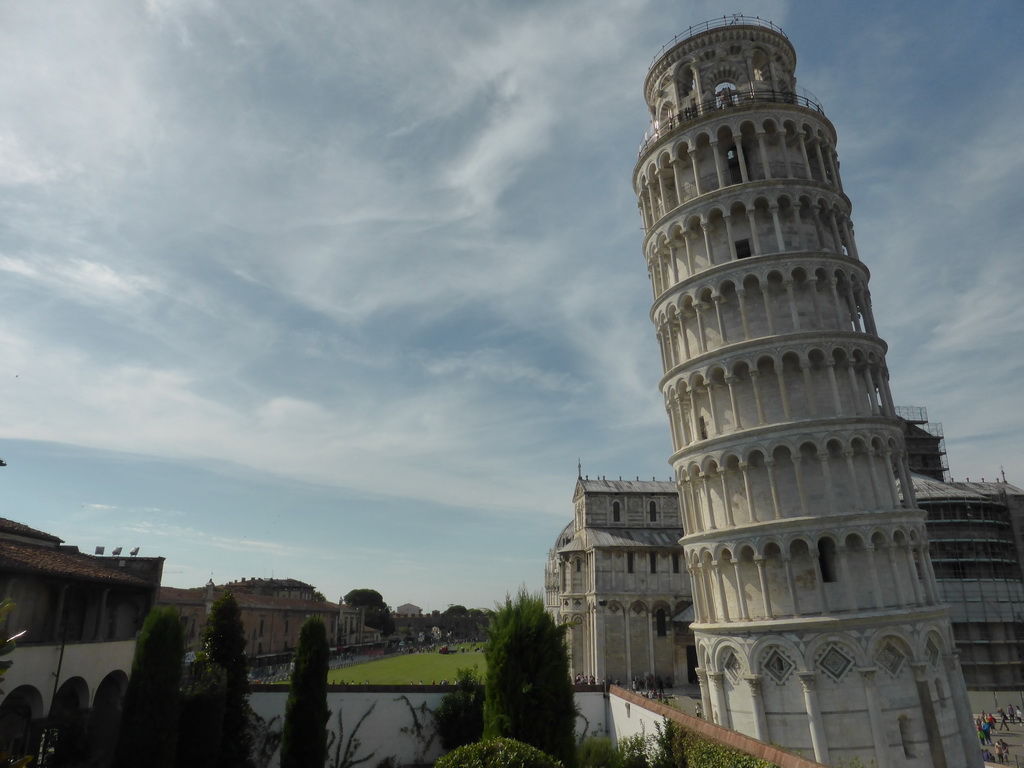 The Garden of the Museo dell`Opera del Duomo museum with a view on the Pisa Duomo cathedral and the Leaning Tower of Pisa