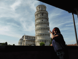 Miaomiao at the upper floor of the Museo dell`Opera del Duomo museum with a view on the Baptistry of St. John, the Pisa Duomo cathedral and the Leaning Tower of Pisa