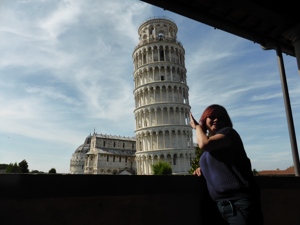 Miaomiao at the upper floor of the Museo dell`Opera del Duomo museum with a view on the Baptistry of St. John, the Pisa Duomo cathedral and the Leaning Tower of Pisa