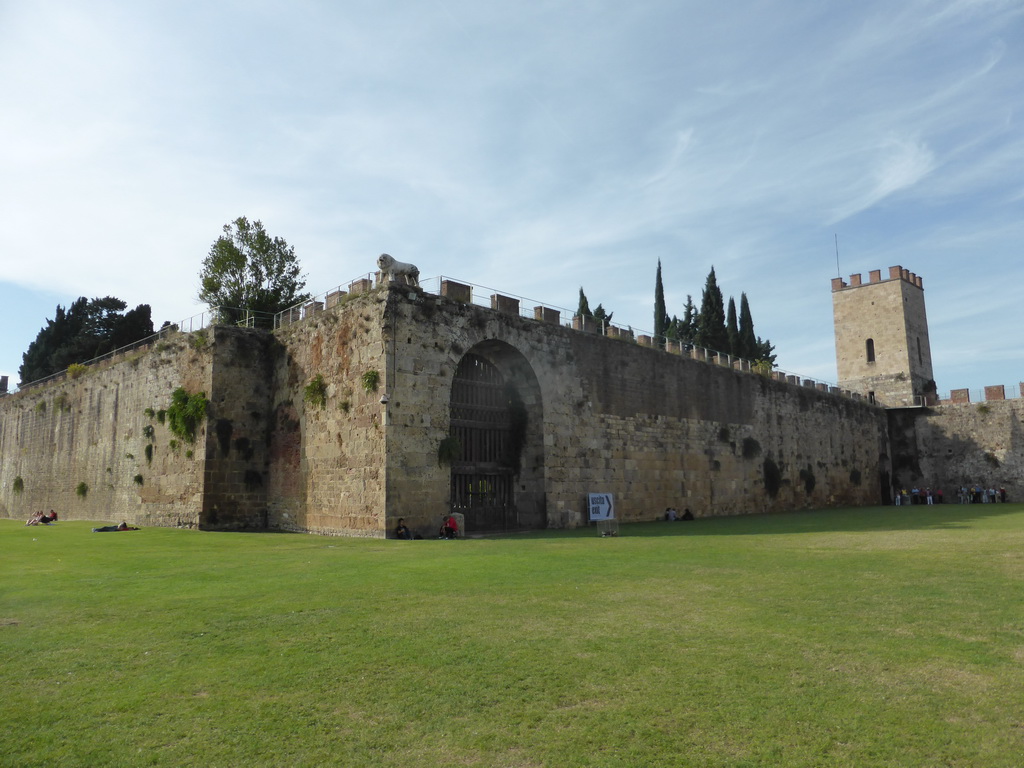 The Piazza del Duomo square and the City Wall with a tower