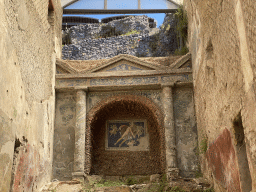 Wall with mosaics and paintings at the Suburban Baths at the Pompeii Archeological Site