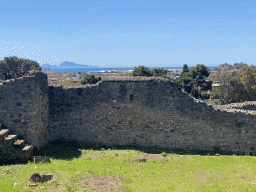 Walls at the House of the Sailor at the Pompeii Archeological Site, with a view on the Tyrrhenian Sea and the island of Capri