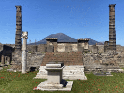 Walls and columns at the Temple of Apollo at the Pompeii Archeological Site, with a view on Mount Vesuvius