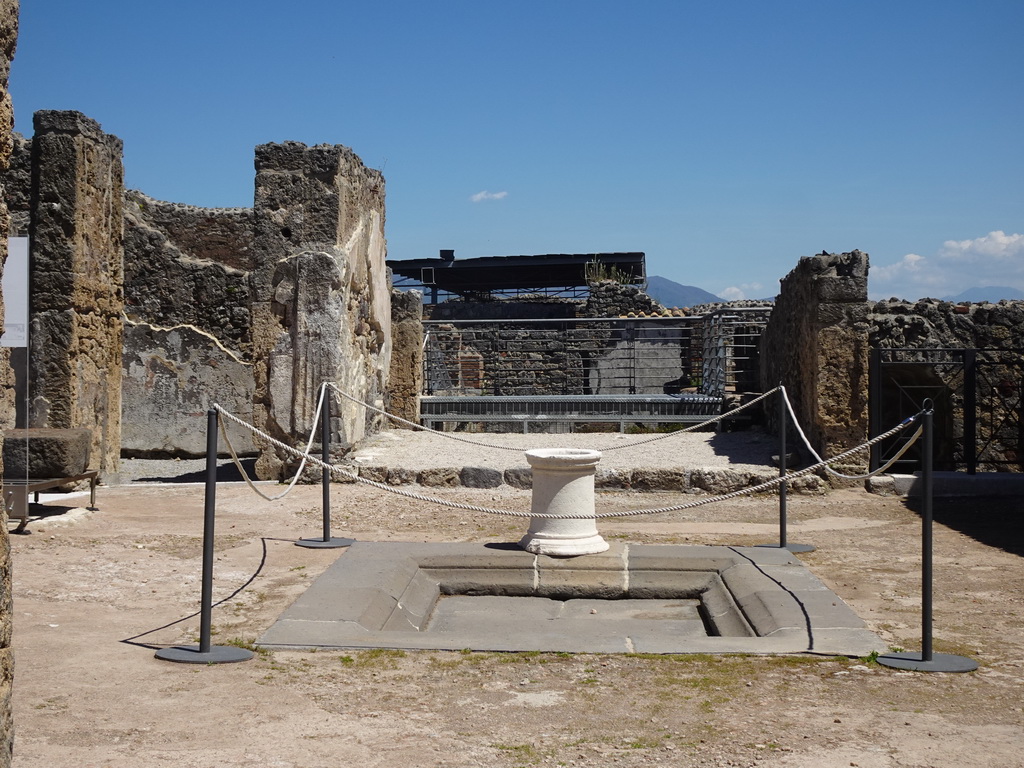 Column and walls at the House of the Anchor at the Pompeii Archeological Site, viewed from the Via di Mercurio street