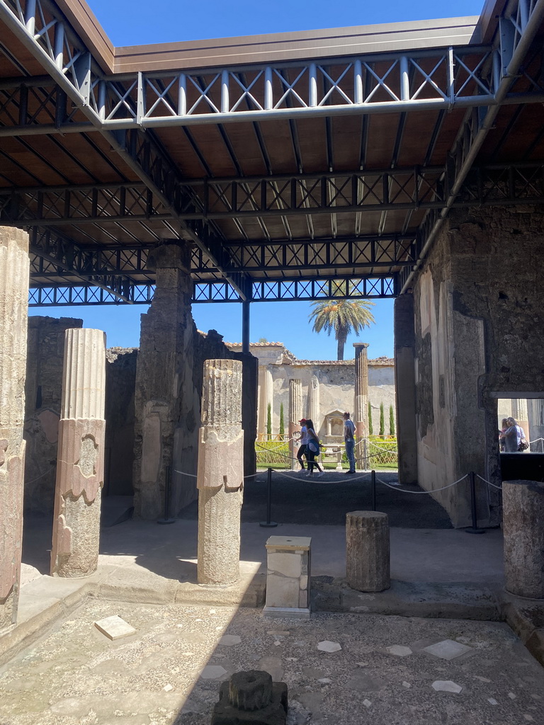Columns and walls at the House of the Dioscuri at the Pompeii Archeological Site