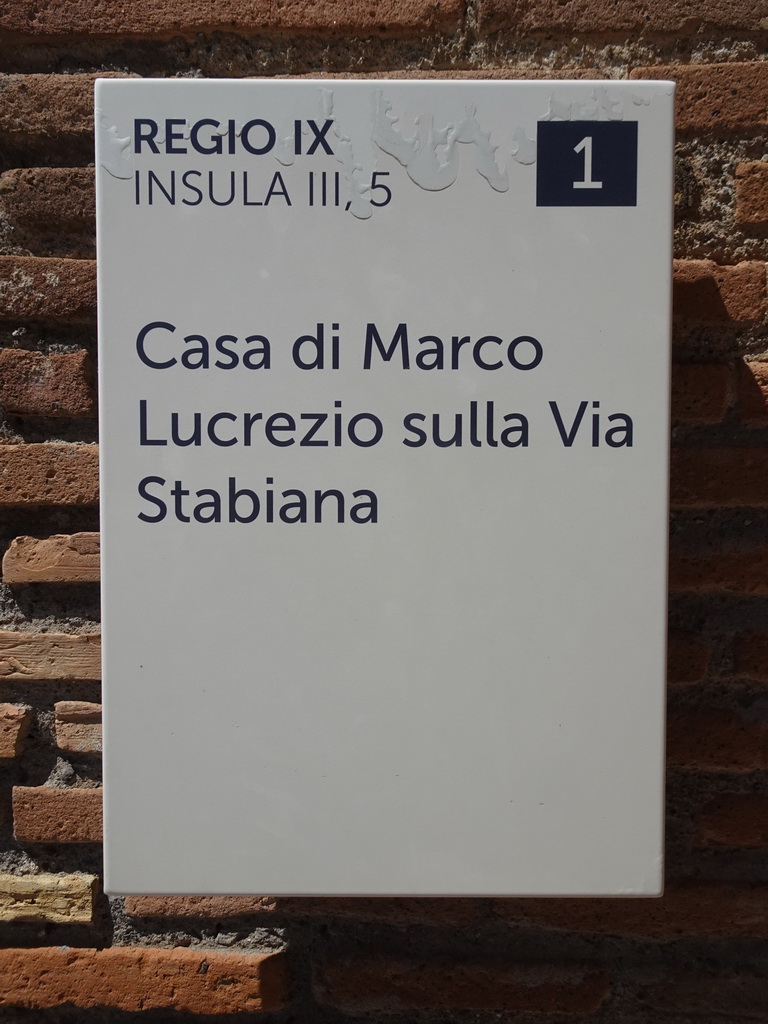 Sign in front of the House of Marcus Lucretius at the Via Stabiana street at the Pompeii Archeological Site