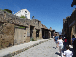 The Via dell`Abbondanza street and the Casina dell`Aquila museum at the Pompeii Archeological Site