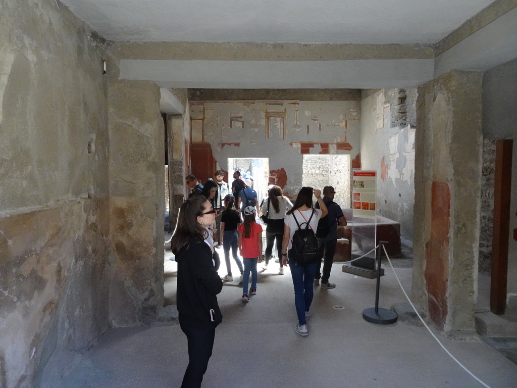 Walls with frescoes at the Fullery of Stephanus at the Pompeii Archeological Site