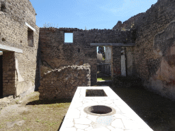 Kitchen of the Praedia of Giulia Felice at the Pompeii Archeological Site, viewed from the Via dell`Abbondanza street