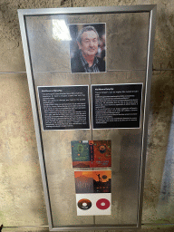 Photograph of Nick Mason and cover art of the `Pink Floyd - Live at Pompeii` movie at the southwest catacombs of the Amphitheatre at the Pompeii Archeological Site
