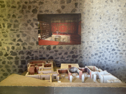Photograph and scale model of the Villa Moregine at the Palestra Grande building at the Pompeii Archeological Site