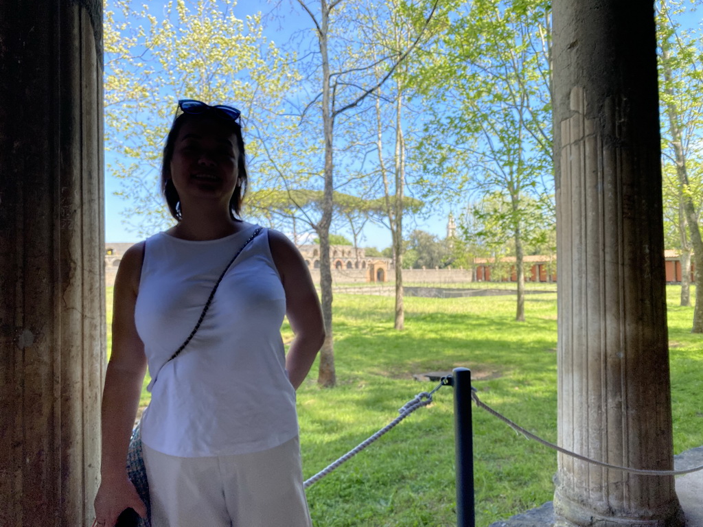 Miaomiao at the Palestra Grande building at the Pompeii Archeological Site, with a view on the Inner Square