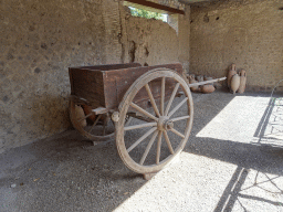 Wooden cart and vases at the House of Menander at the Pompeii Archeological Site