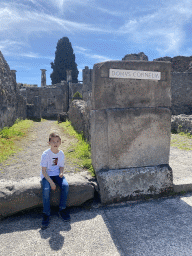 Max in front of the House of the Cornelii at the Via Stabiana street at the Pompeii Archeological Site