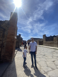 Tim and Max at the Via dell`Abbondanza street at the Pompeii Archeological Site