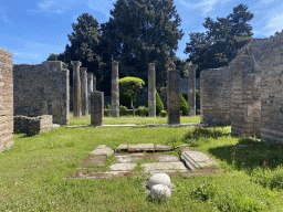 Walls and columns at a house at the Via dell`Abbondanza street at the Pompeii Archeological Site