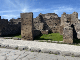 Walls at a house at the Via dell`Abbondanza street at the Pompeii Archeological Site