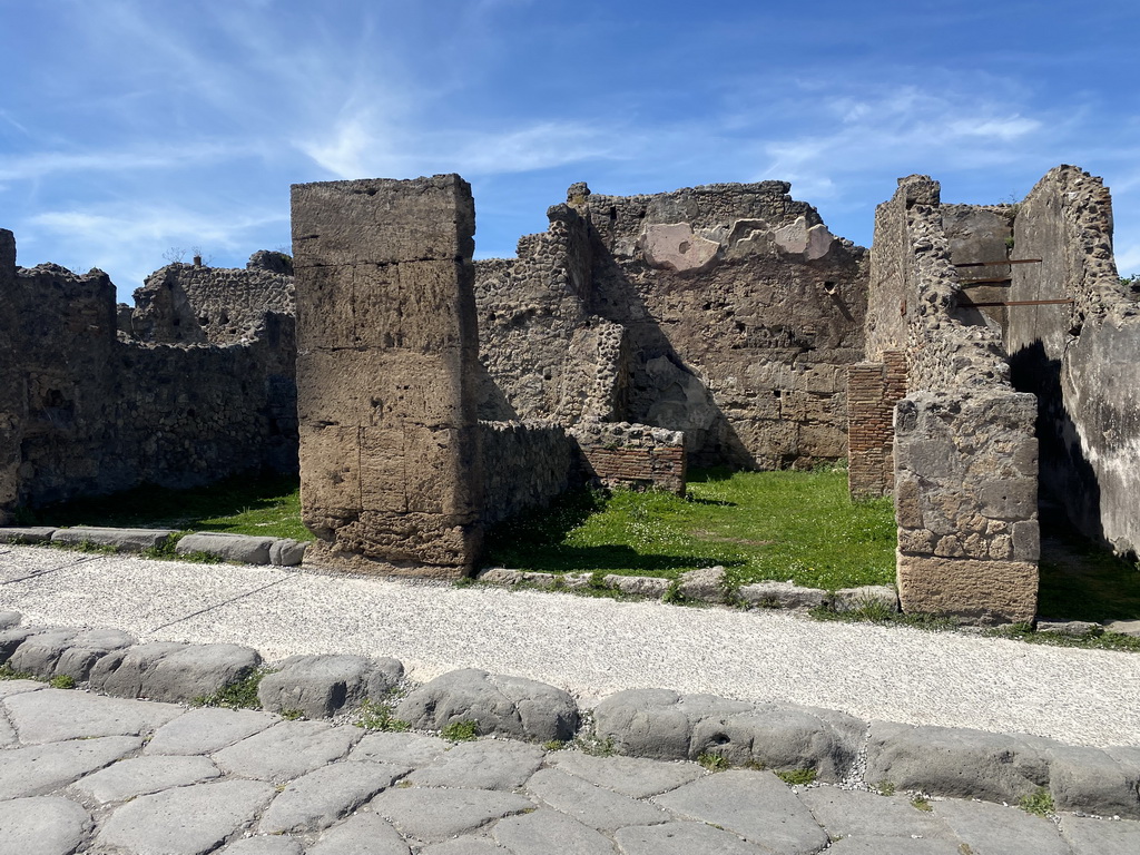 Walls at a house at the Via dell`Abbondanza street at the Pompeii Archeological Site