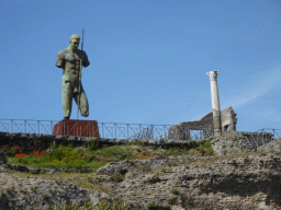 Statue of Daedalus by Igor Mitoraj at the Sanctuary of Venus at the Pompeii Archeological Site, viewed from the path next to the Antiquarium
