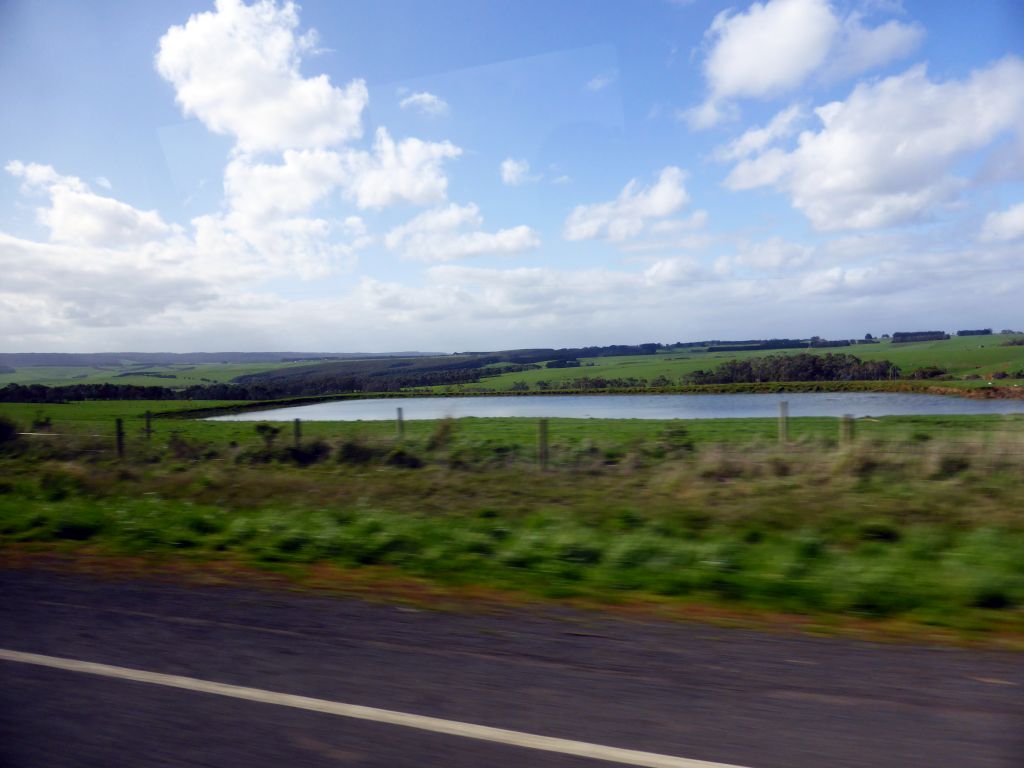 Grasslands, forests and a lake near Princetown, viewed from our tour bus on the Great Ocean Road