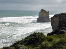 Cliffs at the coastline at the northwest side, with the most eastern rock of the Twelve Apostles rocks, viewed from the top of the Gibson Steps