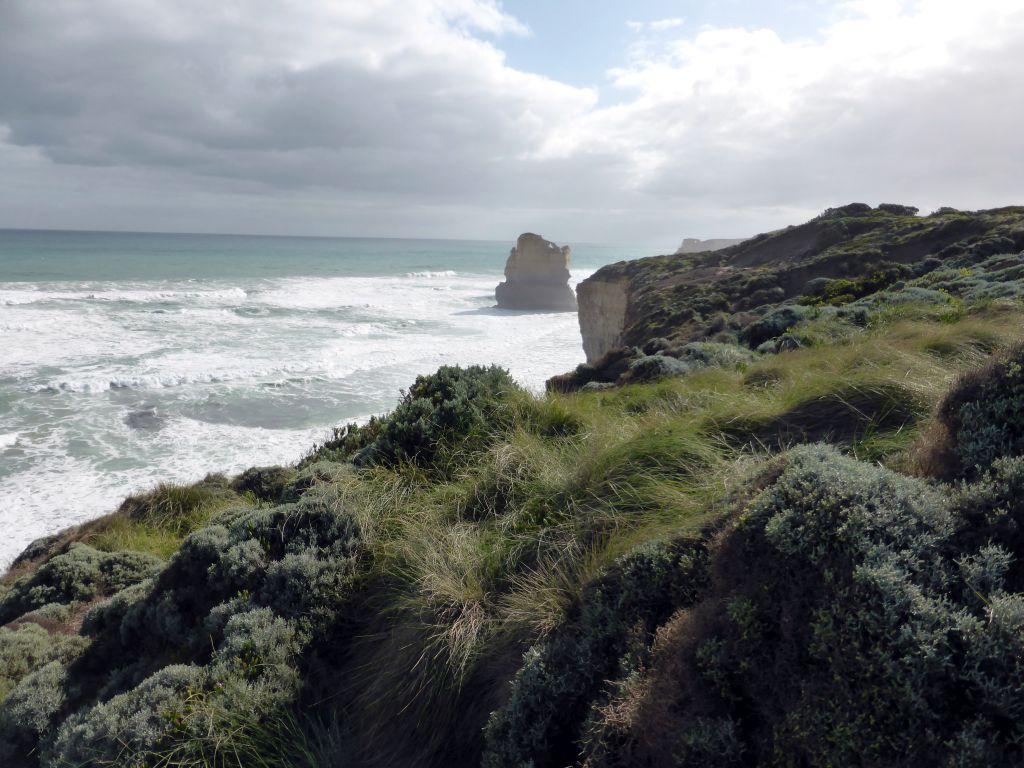 Cliffs at the coastline at the northwest side, with the most eastern rock of the Twelve Apostles rocks, viewed from the top of the Gibson Steps