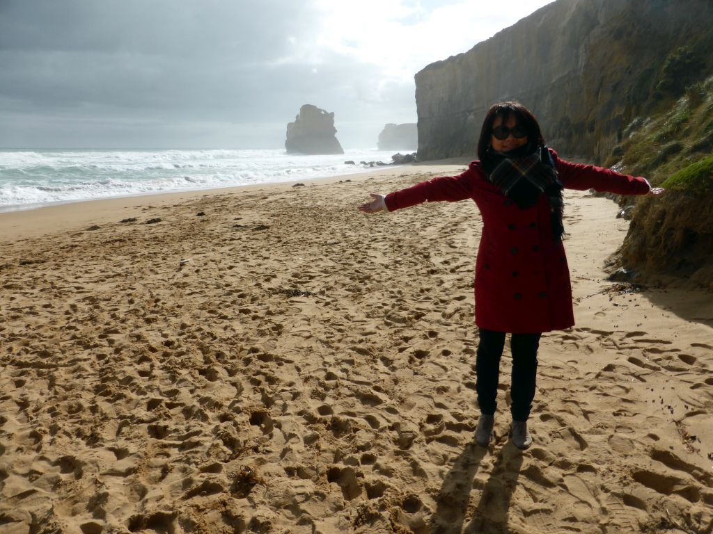 Miaomiao with the beach and cliffs at the northwest side of the Gibson Steps, with the most eastern rock of the Twelve Apostles rocks