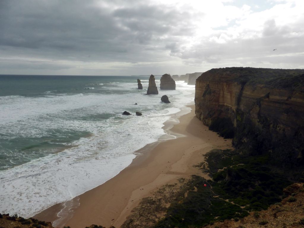 Beach and cliffs at the northwest side with the Twelve Apostles rocks, viewed from the Twelve Apostles viewing point