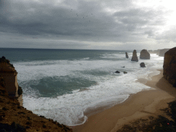 Beach and cliffs at the northwest side with the Twelve Apostles rocks, viewed from the Twelve Apostles viewing point