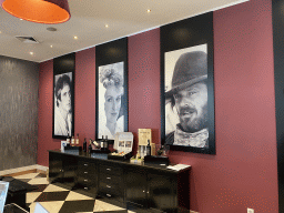 Photographs of movie stars and desk with Port wines at the lobby of the Hotel Vila Galé Porto