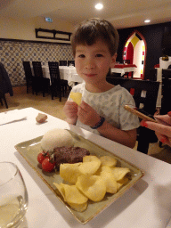 Max having dinner at the Abadia do Porto restaurant