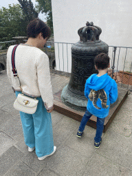 Miaomiao and Max with a bell at the terrace of the Porto Cathedral