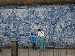 Miaomiao and Max with painted tiles at the terrace of the Porto Cathedral