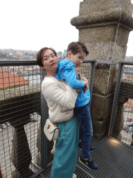 Miaomiao and Max on top of the South Tower of the Porto Cathedral, with a view on the Douro river and Vila Nova de Gaia
