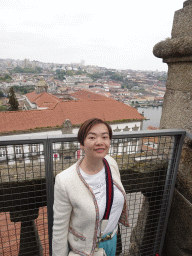 Miaomiao at the South Tower of the Porto Cathedral, with a view on the Paço Episcopal do Porto palace, the Douro river and Vila Nova de Gaia