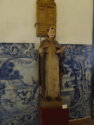 Statue and painted tiles at the Chapter Room at the Porto Cathedral