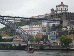 The Ponte Luís I bridge over the Douro river and Vila Nova de Gaia with the Mosteiro da Serra do Pilar monastery, viewed from the Cais da Estiva street