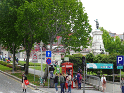 The Praça do Infante D. Henrique square with the statue of Infante D. Henrique and the front of the Mercado Ferreira Borges market