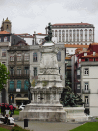 Statue of Infante D. Henrique at the Praça do Infante D. Henrique square, the towers of the Igreja dos Grilos church and the Paço Episcopal do Porto palace